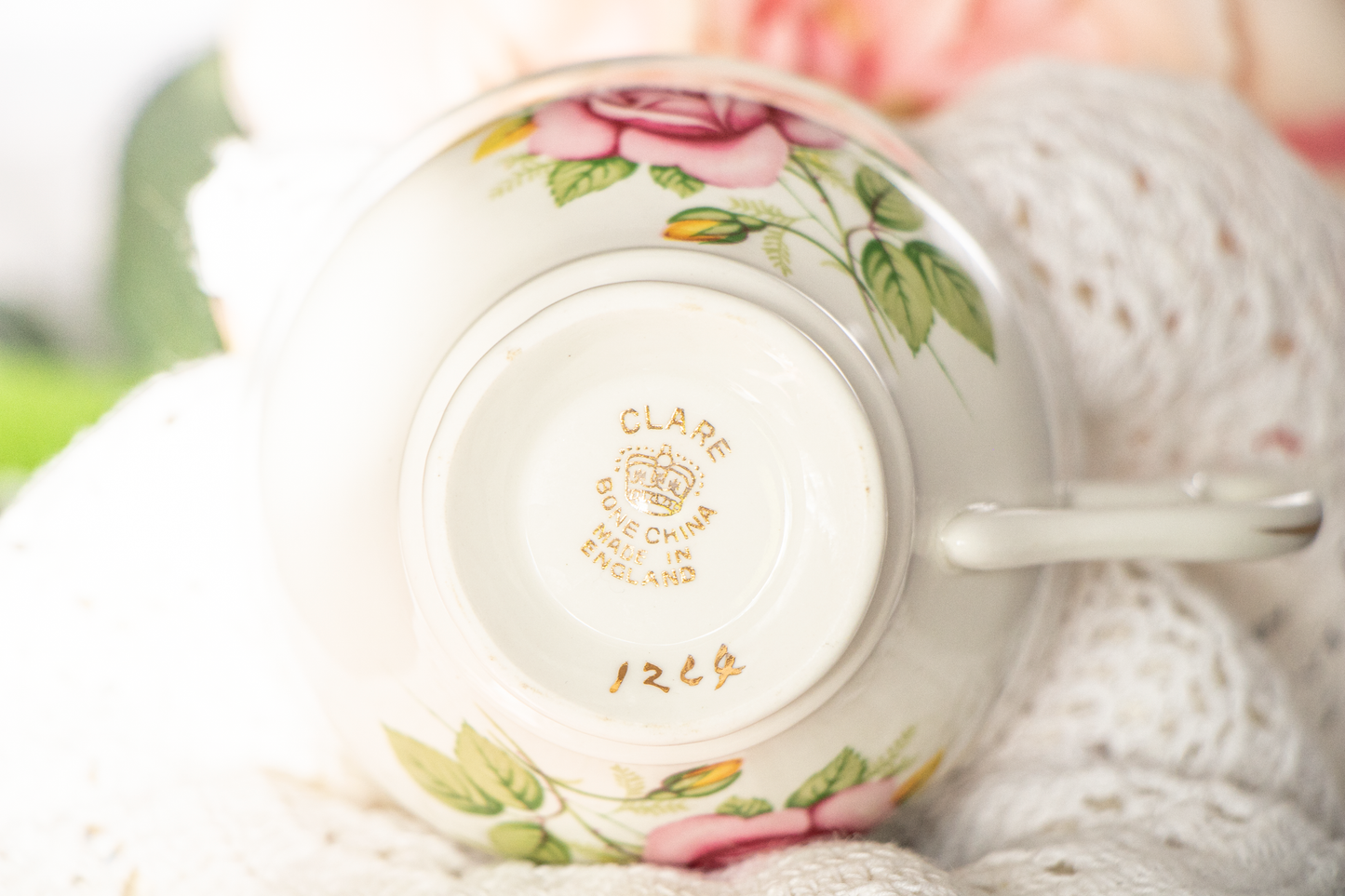 English Rose Afternoon – Tea and roses bathed in warm light