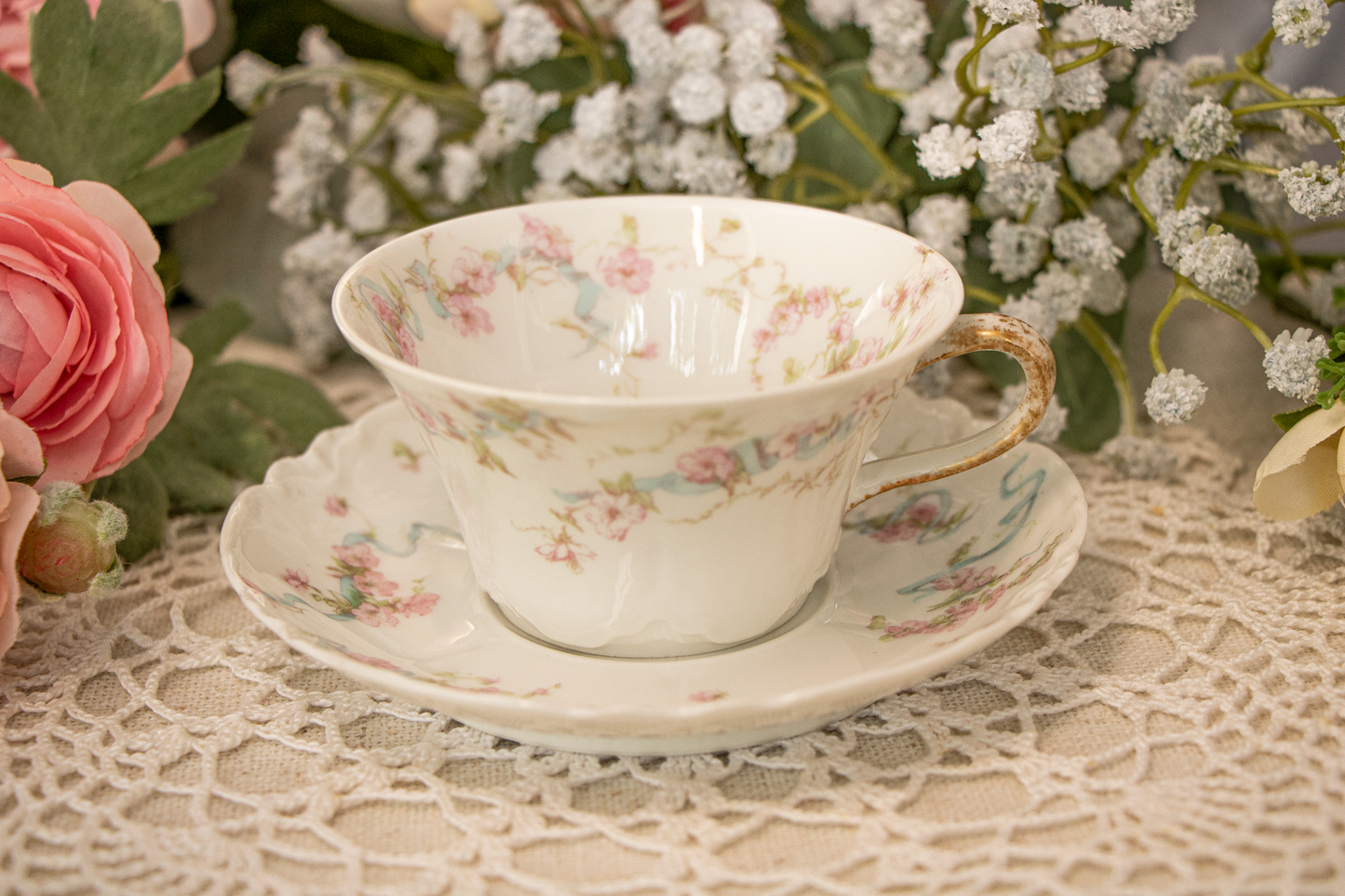 Theodore Haviland Limoges France – Dainty Teacup and Saucer – Pink Floral with Blue Ribbon & Gold Trim (c. 1900–1915)