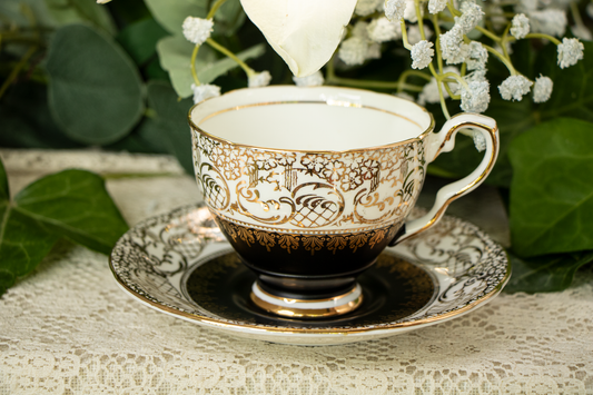 Royal Stafford Bone China Teacup and Saucer — Pattern 1528 — Matte Black with Gold Filigree — 1950s–1960s