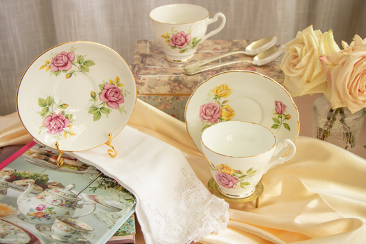 English Rose Afternoon – Tea and roses bathed in warm light