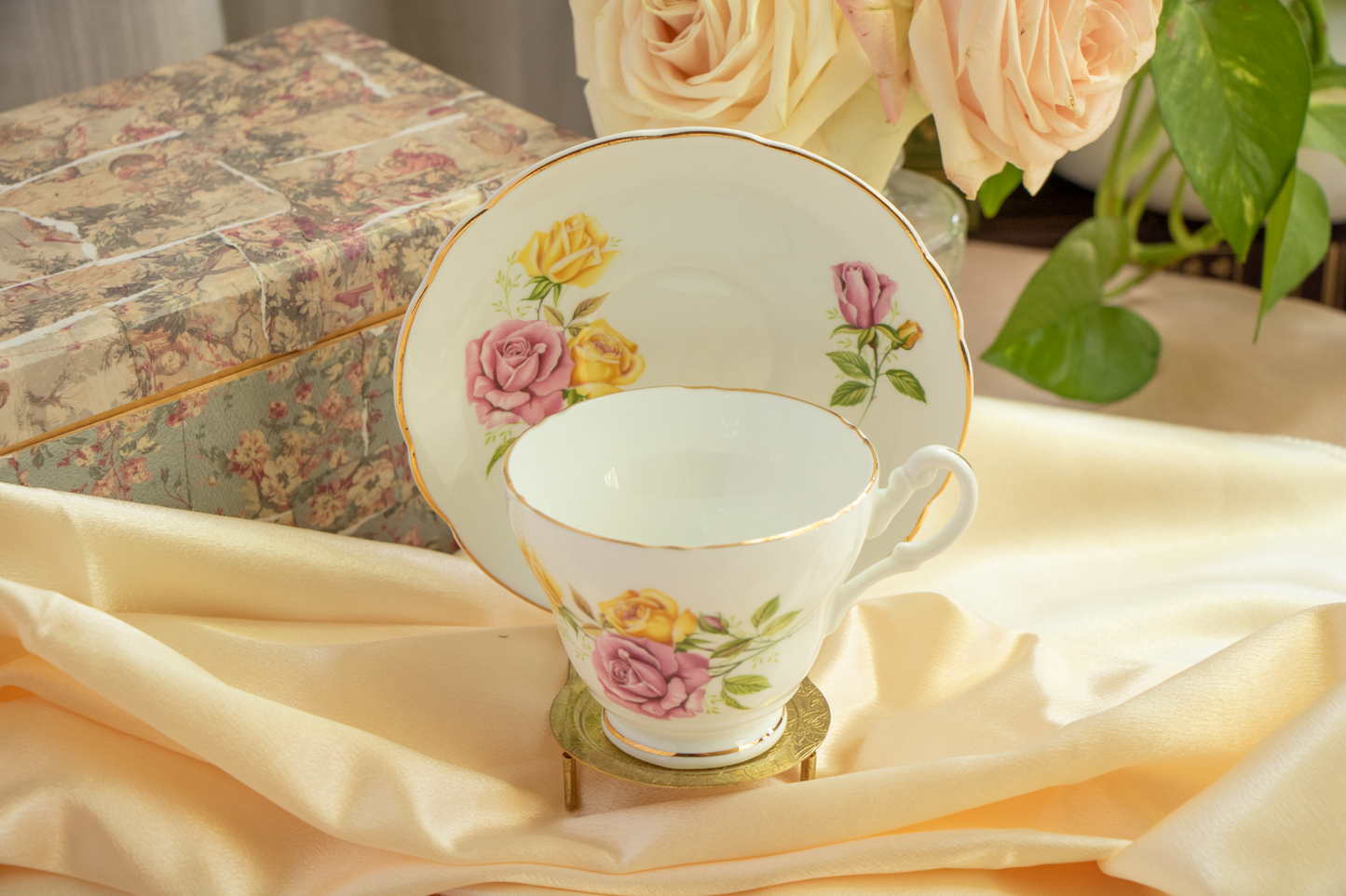 English Rose Afternoon – Tea and roses bathed in warm light