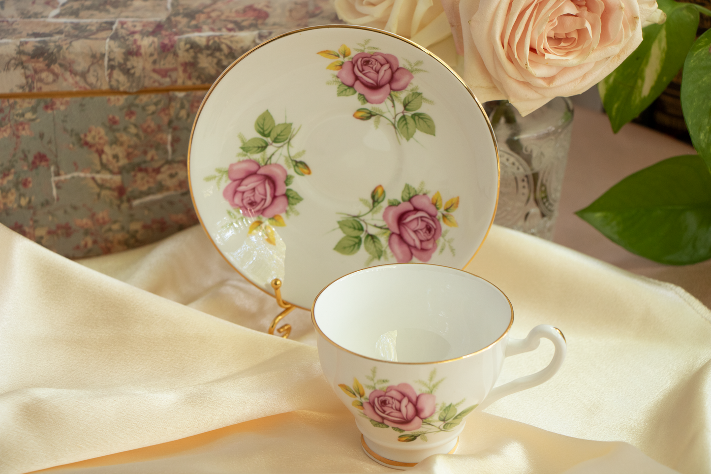 English Rose Afternoon – Tea and roses bathed in warm light